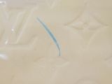 a blue line in the bottom of a bowl of soup