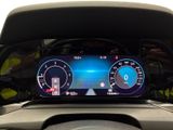 a car dashboard with a digital display on it