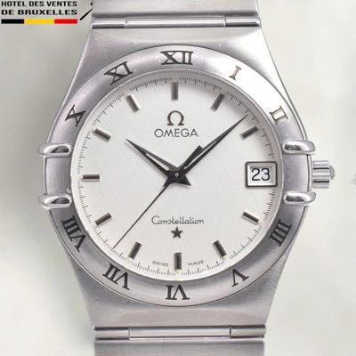 an image of a close up of a watch with roman numerals on it