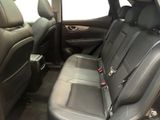 the back seats of a car are empty with no one in it