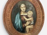 tableau représentant une femme tenant un bébé dans ses bras, dans un cadre rond