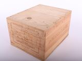 a wooden box that is sitting on a white surface
