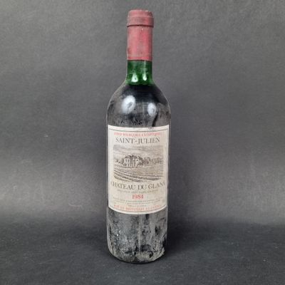 a bottle of wine that is sitting on a table