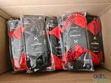 three pairs of black and red socks are in a cardboard box