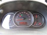 a close up of a car dashboard with a speedometer