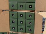 several boxes are stacked on top of each other in a warehouse