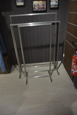 a picture of a bathroom with a toilet and a fire extinguisher