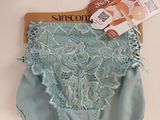 a pair of panties that are sitting on top of a hanger