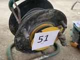 a hose that is sitting on the ground with a number 51 on it