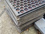 a pile of concrete blocks sitting on the side of the street
