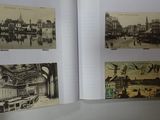 a book opened to show pictures of a city