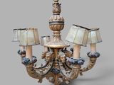 an image of a chandelier with three lamps on each side of it