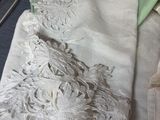 a pile of cloths that are sitting on a table