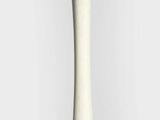 a white vase that is sitting on a table