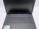 the dell laptop is open and ready to be used
