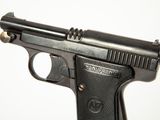 a close up of a gun on a white background
