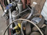 an image of a machine that is sitting in a garage