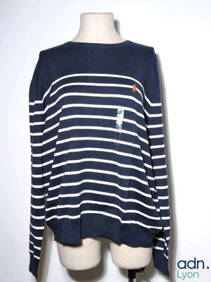 navy blue and white striped sweater with orange patch on chest