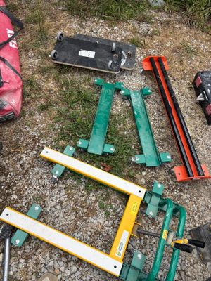 a lot of tools that are laying out on the ground