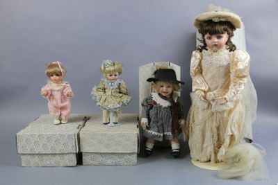 a group of dolls that are sitting next to each other