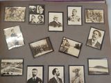 a lot of old black and white photos on the wall