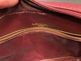 the inside of a handbag with a zipper on it
