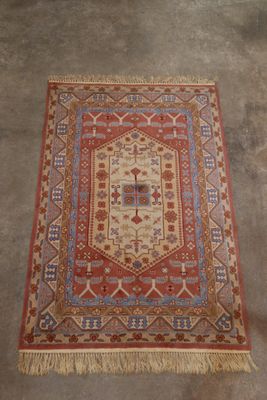 Tapis polychrome fait main (123x180 environ) à réserve centr…