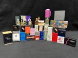 a lot of different types of perfumes on a black background
