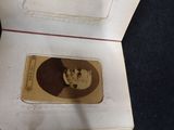 an old picture of a man on the inside of a box