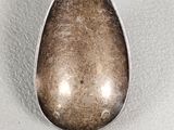 a spoon that is sitting on top of a table