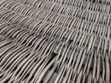 a close up view of a wicker table top