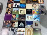 a lot of different albums on the floor together