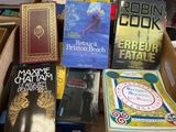 a lot of books that are sitting on a table