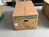 two boxes sitting on the floor next to each other
