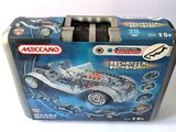 a metal box with a toy car inside of it