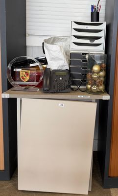 a small refrigerator in the corner of a room