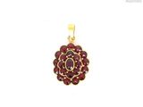 a close up of a red flower pendant on a white background