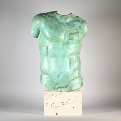 sculpture of a male torso on a marble base