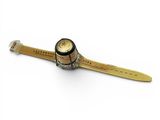 wrist watch made of wood and metal with a gold dial