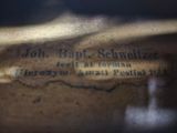 a close up of a piece of paper with writing on it