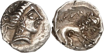 a silver coin with an image of a man and a woman on it