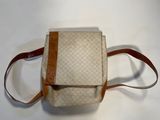 an image of a purse on a white surface
