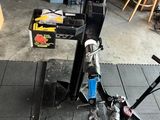 a bike that is sitting on a stand in the garage