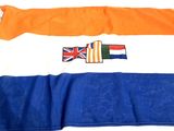 flags of different countries are laid out on a white surface