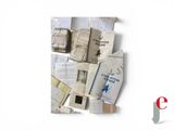 a pile of old books on a white surface