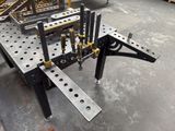 an image of a metal work bench in a warehouse