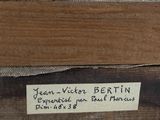 a piece of wood that has a label on it