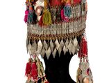 an image of a colorful hat with tassels on it
