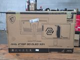 a cardboard box with a picture of a computer on it