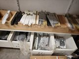many different types of electronic parts in the drawer